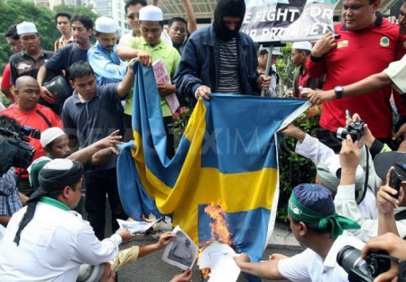 Švédsko – řádění gangů a nová premiérka