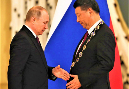 Putin přiletěl do Číny na dvoudenní návštěvu